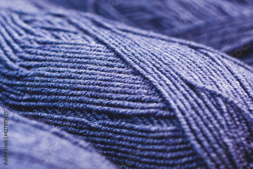 lots of fine yarn of gray-blue color close-up