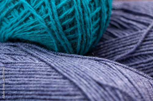 tangles of fine yarn of gray-blue and turquoise color close-up