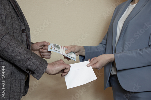 Quadro su tela Man giving bribe money to woman, closeup of hands
