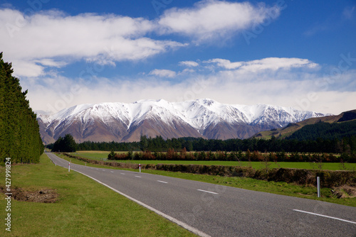 mountain chain in new zealand seen from the roadside