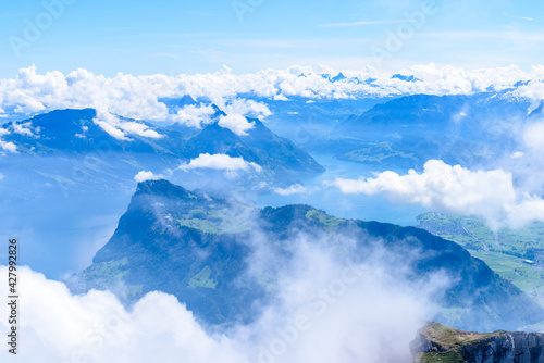 View of Swiss Alps from Mt. Pilatus trail and Lucerne lake (Vierwaldstattersee) in Lucerne, Switzerland