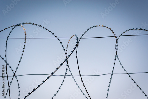 Barbed wire over the fence.