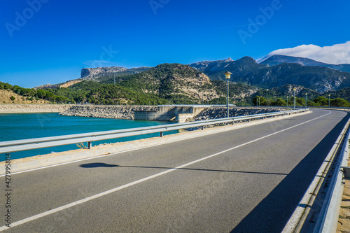 the road on the 1920s dam that create the Guadalhorce and Guadalteba Reservoirs in Andalusia, Spain