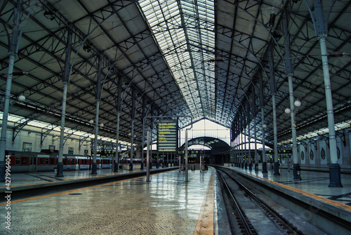 Lisbon, Portugal. Rossio railway station. Empty train station with arriving trains written on the information board.