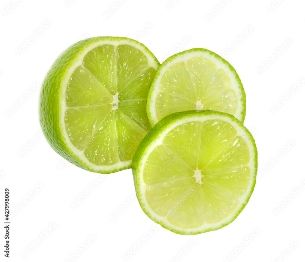 Three pieces of lime close-up isolated on white background.