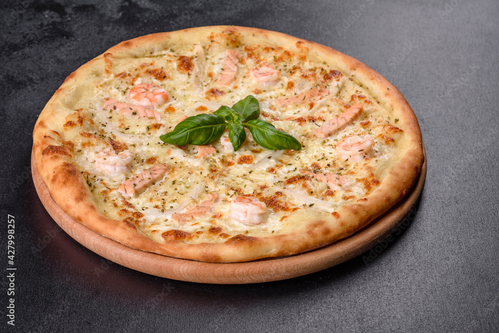 Delicious fresh seafood oven pizza: red fish and shrimp Delicious fresh seafood oven pizza: red fish and shrimp