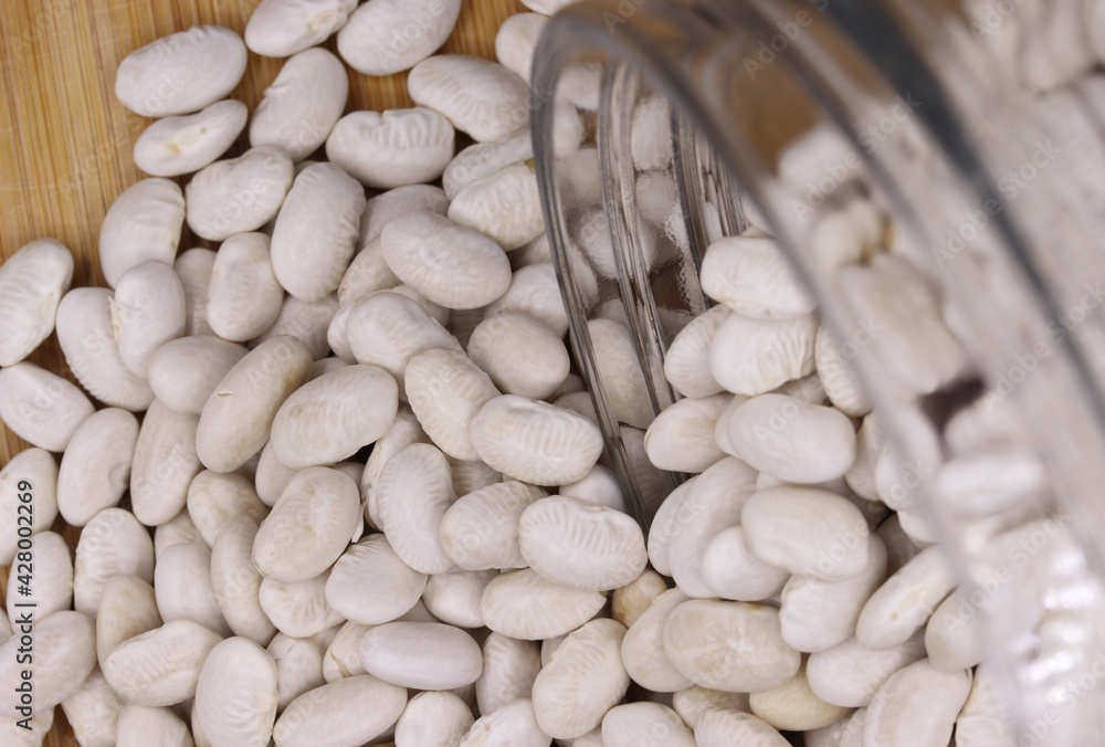 organic dried white beans on a background organic dried white beans on a background
