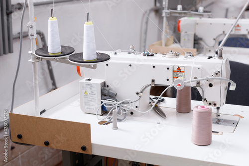 sewing machine with threads in production