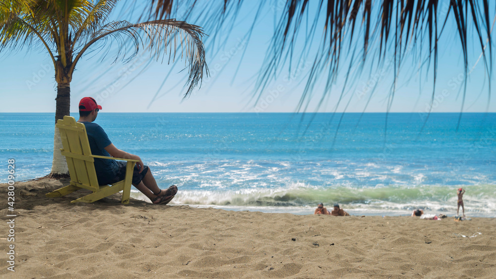 Relaxing in the beach during vacations Relaxing in the beach during vacations