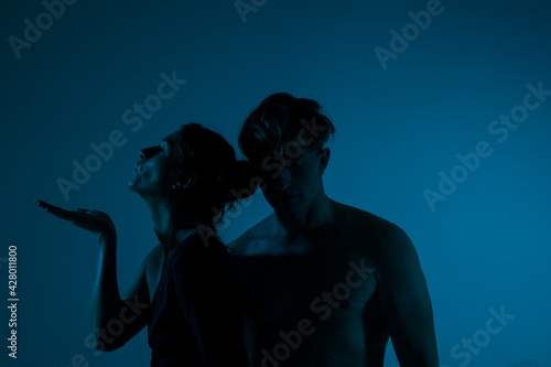 Beautiful couple of people in love. Lvoe couple. Sensual. Dark. Background. 