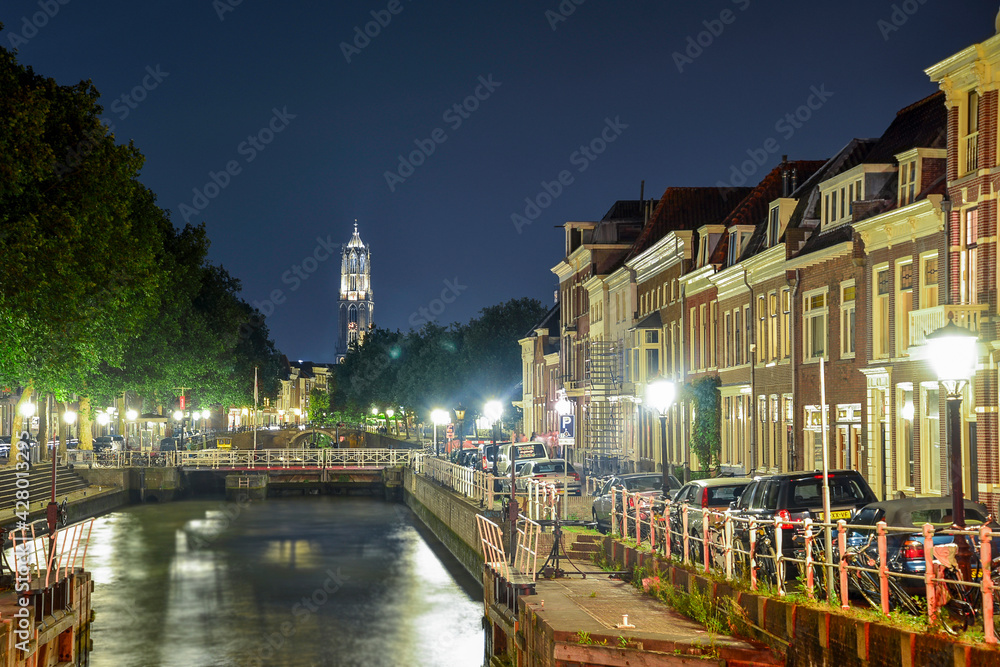 Amsterdam city at night over the canal 