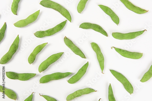 fresh green soybeans on white background.