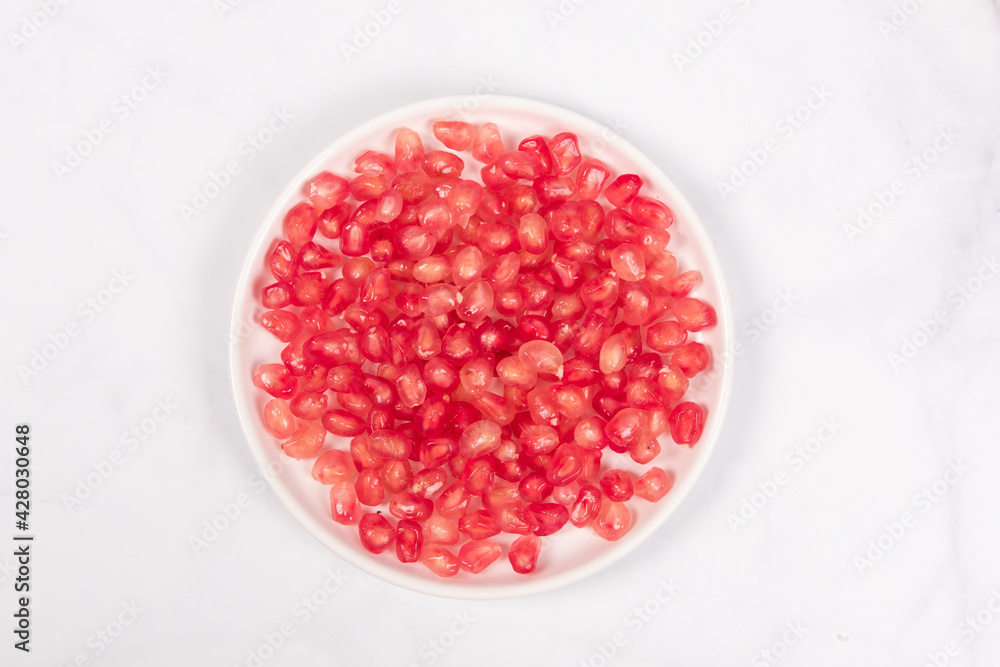Fresh ripe pomegranate with clipping path on white background. Fresh ripe pomegranate with clipping path on white background.