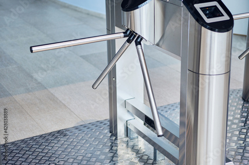 Iron bars of the turnstile for the passage of visitors