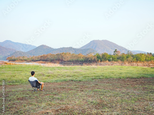 Wallpaper Mural Solo traveler enjoying to beautiful landscape mountain lake. Torontodigital.ca