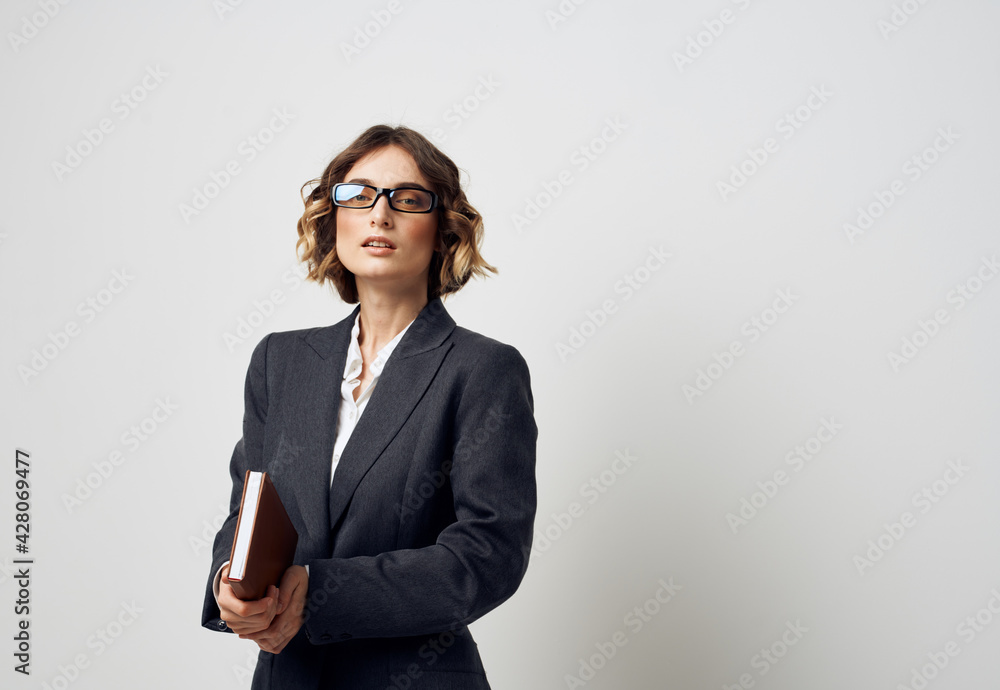 Woman in glasses business finance documents and black jacket shirt Woman in glasses business finance documents and black jacket shirt