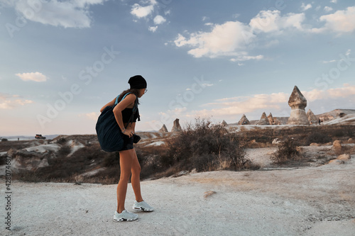 Obraz na płótnie Beautiful tourist woman walking in Love valley in Goreme village w salonie