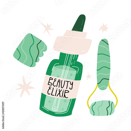 Gua sha or jade scraper and roller and face beauty elixir serum. Beauty routine, skincare, anti-aging routine concept. 