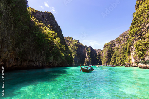 Beautiful turquoise ocean of Pileh Lagoon is a very beautiful place and one of the popular tourist attractions in Phi Phi Le island in Krabi, Thailand. © pjjaruwan