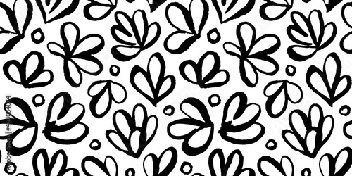 Abstract seamless pattern. Modern Artistic plants, flowers hand drawn with brush on black background. Children drawing crayons in doodle style. Contemporary White ink over paper