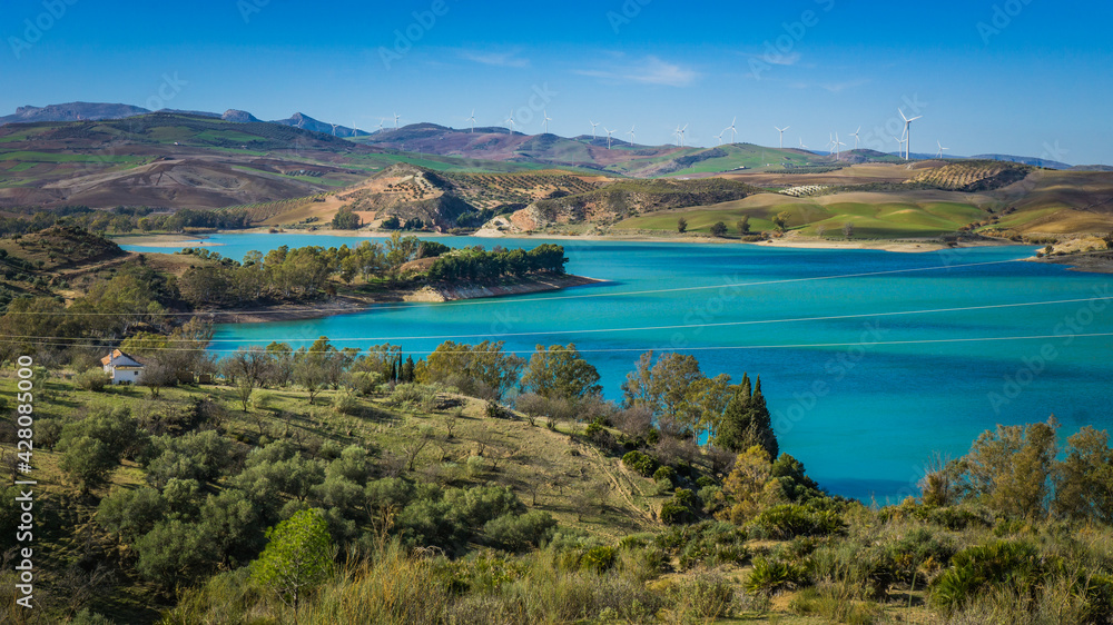 View on the turquoise water of the Guadalhorce and Guadalteba Reservoirs, two artificial lakes in the andalusian backcountry in Spain View on the turquoise water of the Guadalhorce and Guadalteba Reservoirs, two artificial lakes in the andalusian backcountry in Spain