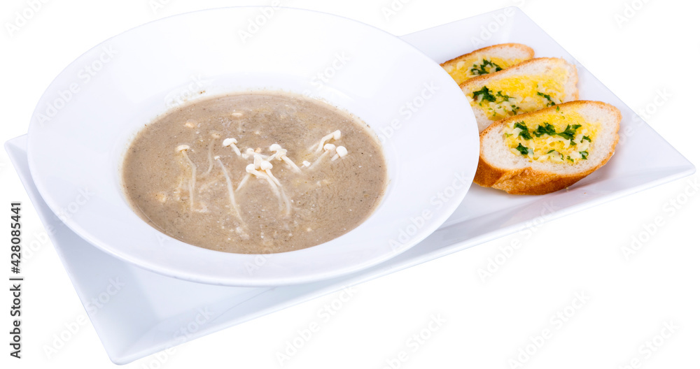 Mushroom cream soup with grilled brad on the whiter plate, food, white background. Mushroom cream soup with grilled brad on the whiter plate, food, white background.