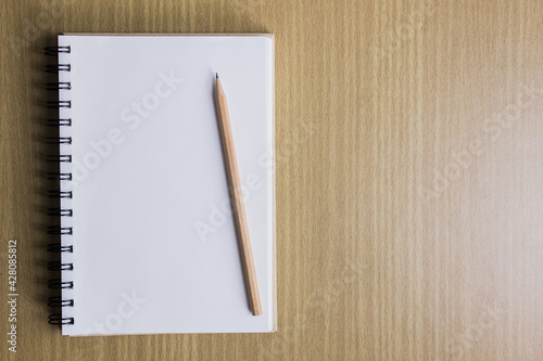 Working items with copy space on a wooden table