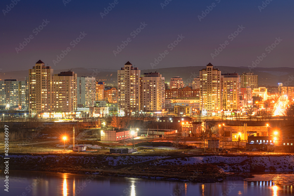 panoramic view of illuminated city at night 