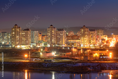panoramic view of illuminated city at night  © photollurg