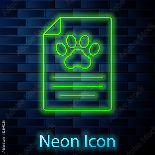 Glowing neon line Clipboard with medical clinical record pet icon isolated on brick wall background. Health insurance form. Medical check marks report. Vector