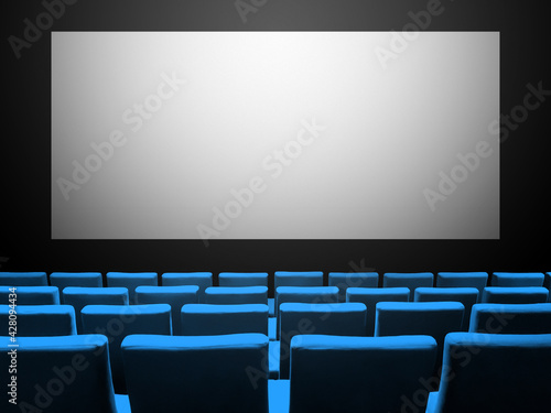 Cinema movie theatre with blue seats and a blank white screen