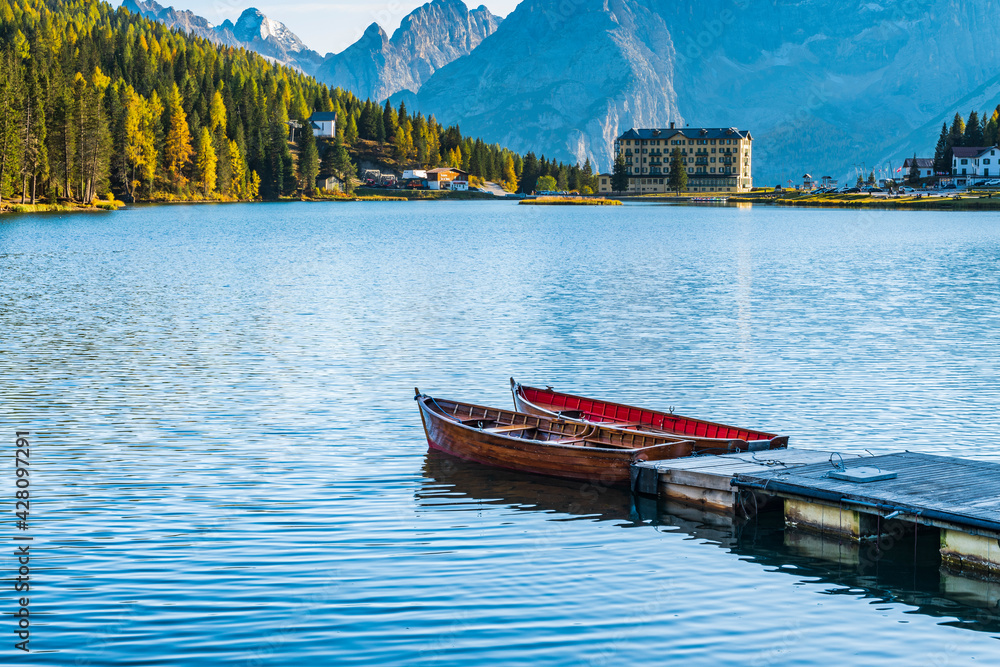 Magical reflections on the Misurina lake. Sunsets on the Dolomites.