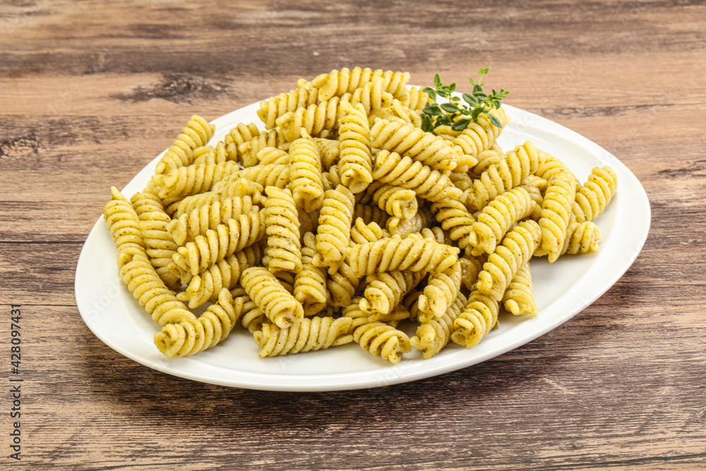 Italian pasta Fusilli with pesto Italian pasta Fusilli with pesto