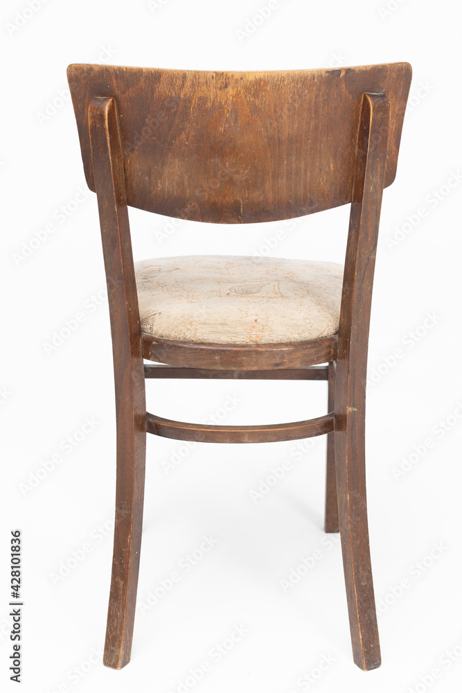 Wooden chair from turn of 70's and 80's from previous century with soft seat. Polish design and production. Rear view Wooden chair from turn of 70's and 80's from previous century with soft seat. Polish design and production. Rear view