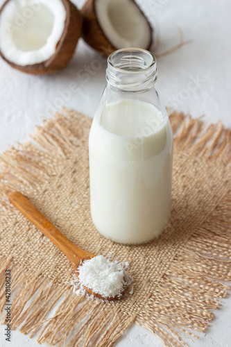 Coconut milk and fresh coconuts. Vegetarian food. Healthy eating.