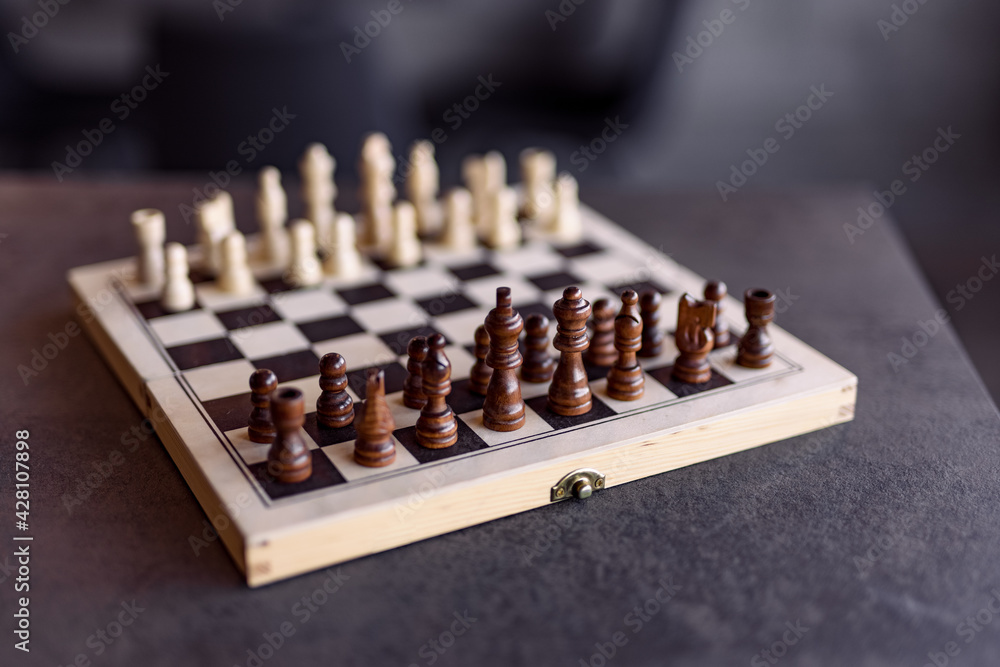 Image of a chess board with chess figures prepared for a new match. Image of a chess board with chess figures prepared for a new match.