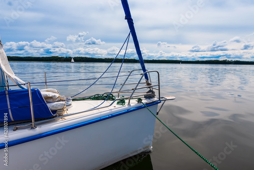 Sailing on a lake. view on a sailboat detail, sailboat bow. Summer vacations, cruise © lenaivanova2311
