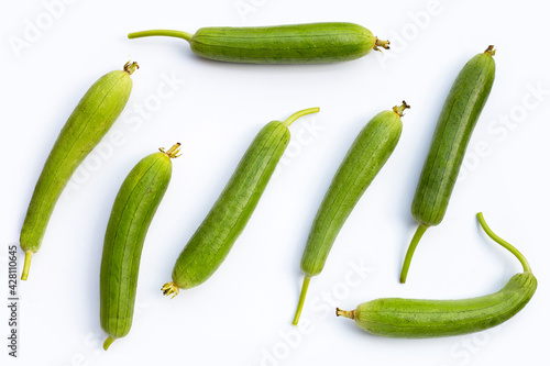 Canvas Print Fresh green sponge gourd or luff on white