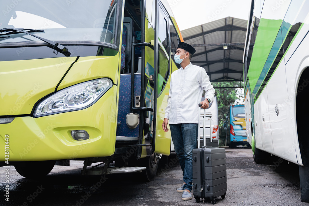male muslim travel by public bus during pandemic wearing mask male muslim travel by public bus during pandemic wearing mask