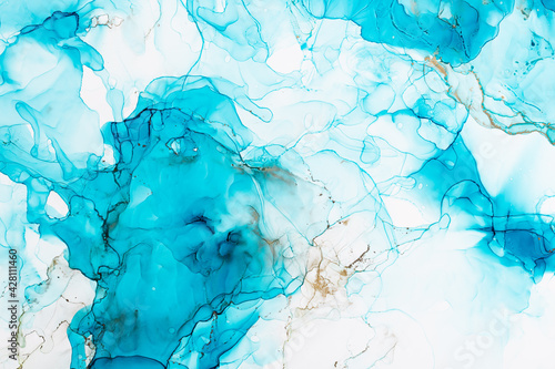 Alcohol ink abstract background. Aquamarine gold marble texture. Modern fluid art