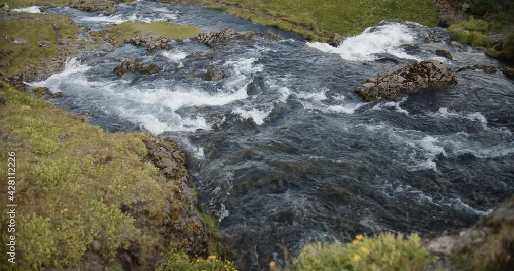 Beautiful rocky river in Iceland, slow motion cinematic shot Beautiful rocky river in Iceland, slow motion cinematic shot