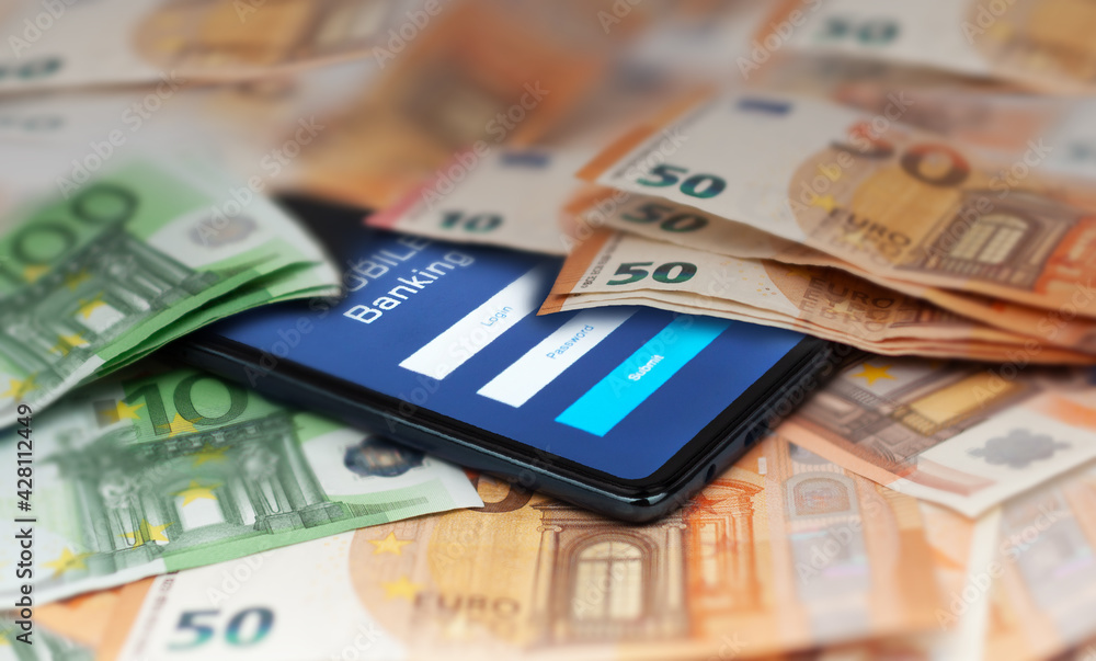 smartphone with stock exchange market application, euro banknotes smartphone with stock exchange market application, euro banknotes