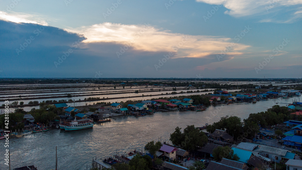 Fototapeta premium Photo of saline from drone bird eye view. Salt field at Samut sakhon , Thailand