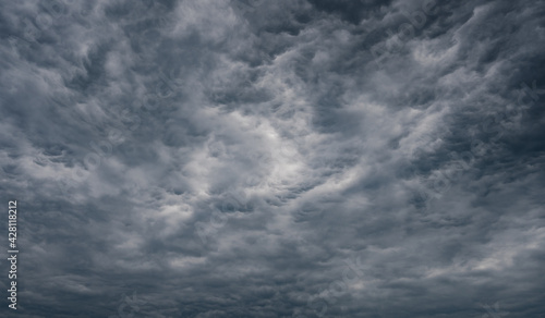 Dark grey storm clouds background. View of Rain clouds in sky.