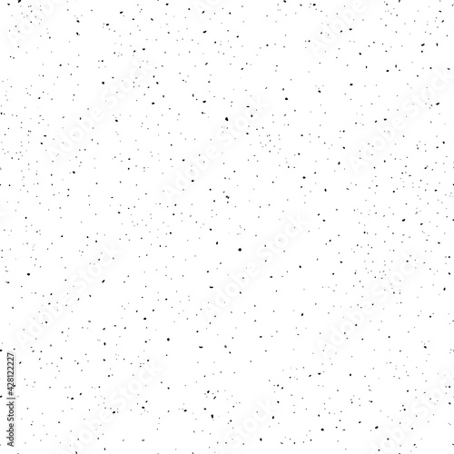 Black little stains seamless pattern. Scattered specks on white background. Grunge surface vector texture seamless pattern.