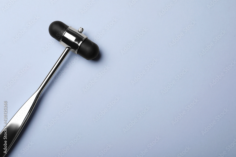 Reflex hammer on grey background, top view with space for text. Nervous system diagnostic Reflex hammer on grey background, top view with space for text. Nervous system diagnostic