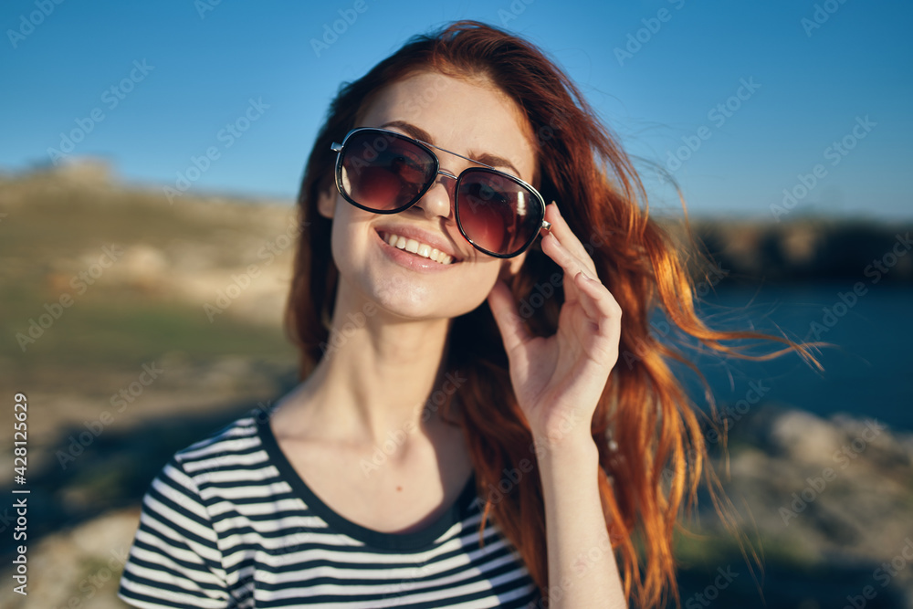 happy woman on the beach in the mountains near the river high cliffs landscape fresh air happy woman on the beach in the mountains near the river high cliffs landscape fresh air