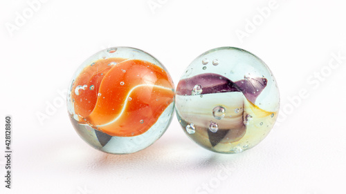 two marbles on white background