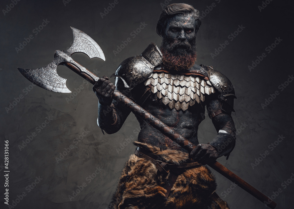 Dangerous antique warrior from the ash holding a huge axe Dangerous antique warrior from the ash holding a huge axe