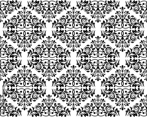 Wallpaper in the style of Baroque. Seamless vector background. White and black floral ornament. Graphic pattern for fabric, wallpaper, packaging. Ornate Damask flower ornament